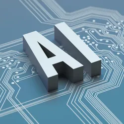 A graphic depicting the letters AI sitting on top of a microchip board